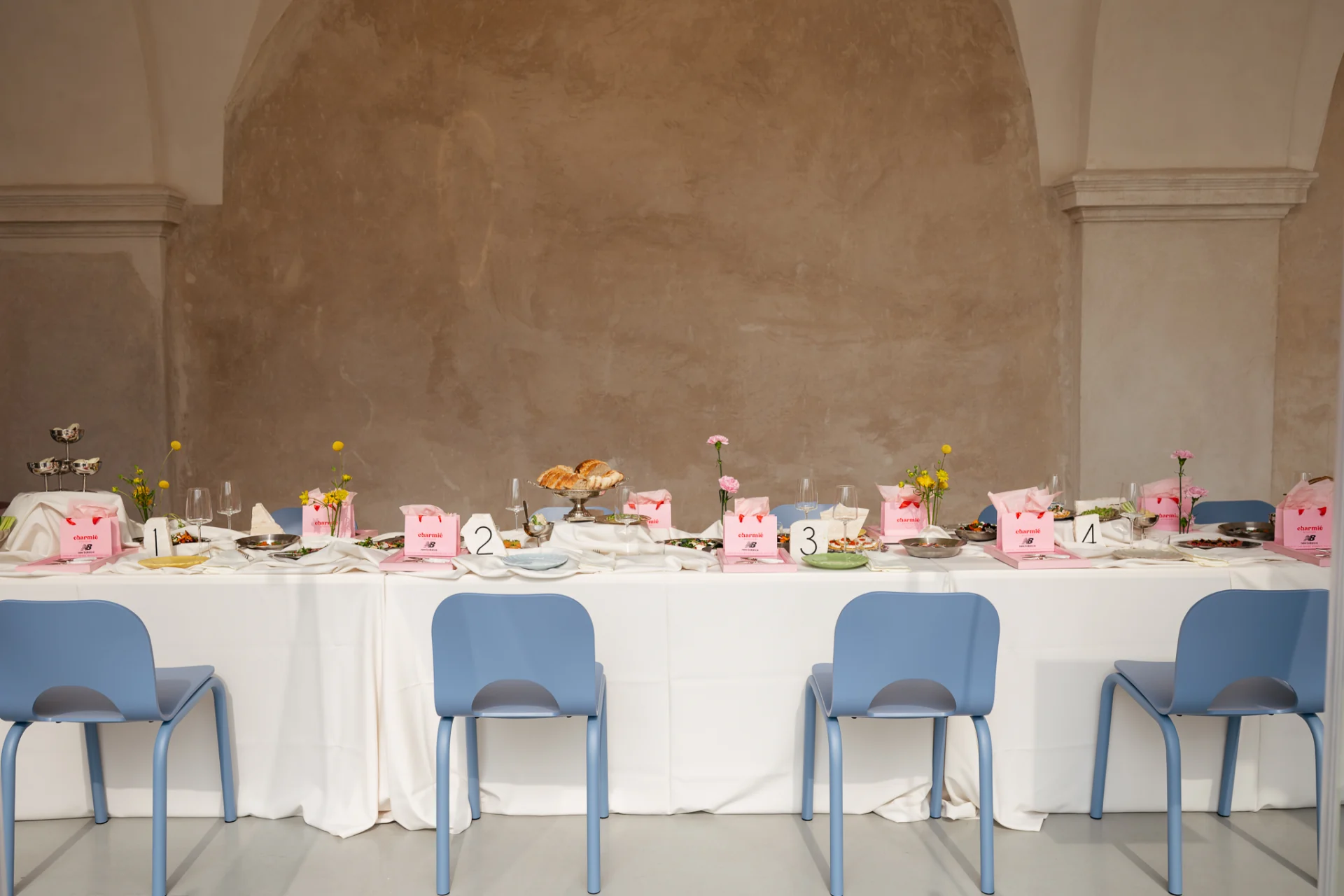 Pink trays with flowers and Charmié branding