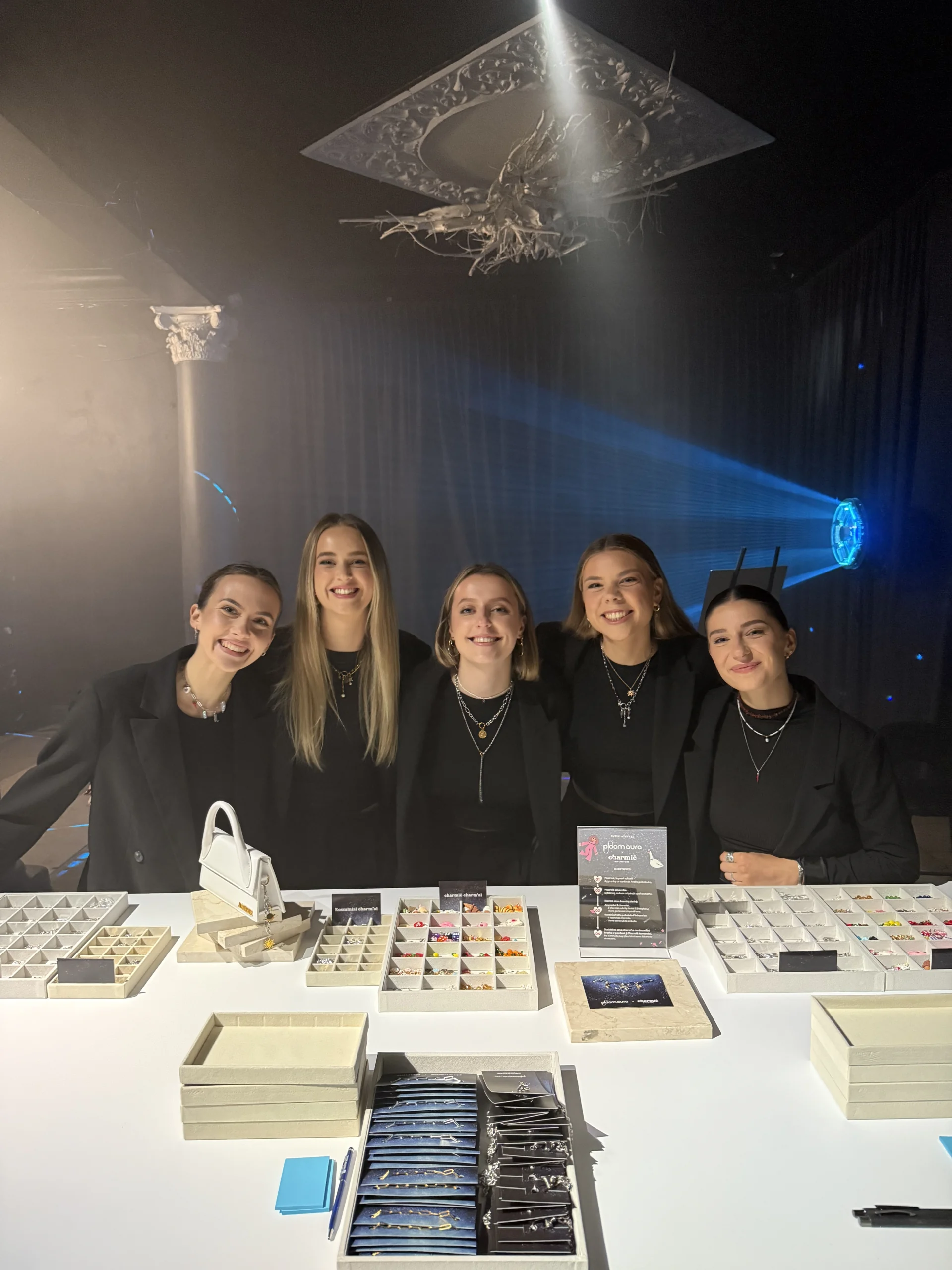The Charmié team at an event booth